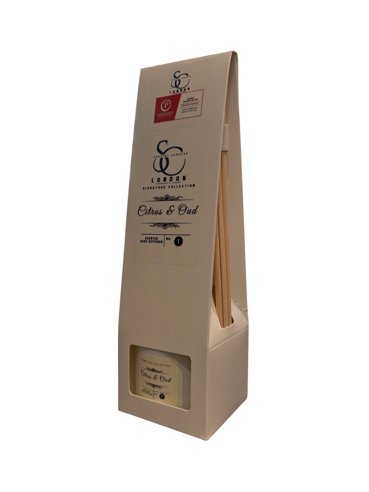 100ml citrus and oud reed diffuser in a white glass bottle packaged in a classic white luxury box with reeds