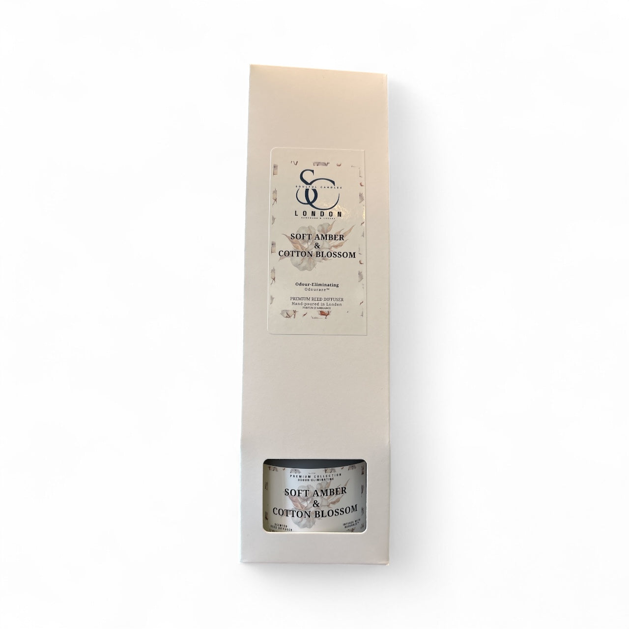 Front of Soft Amber & Cotton Blossom 100ml odour eliminating reed diffuser, white box packaging, handmade in London