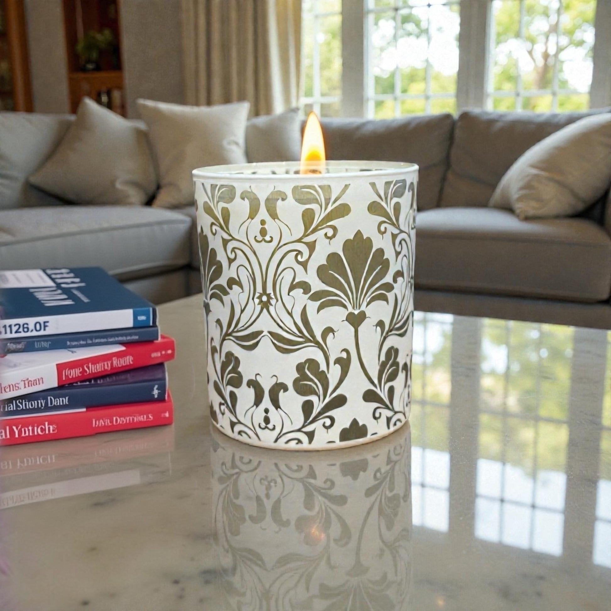 Decorative Honeysuckle and Sandalwood candle with floral pattern on a marble surface in a living room.