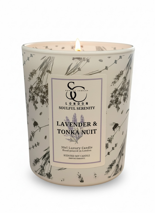 Candle with a decorative label on a white background