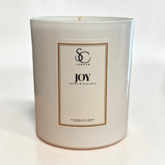 Joy luxury 30cl soy candle designed to uplift and energise with bright citrus and soft floral fragrance notes