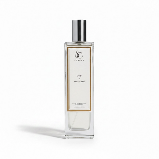 Oud & Bergamot 100ml luxury room spray by Soulful Candles London in a clear glass bottle with silver cap