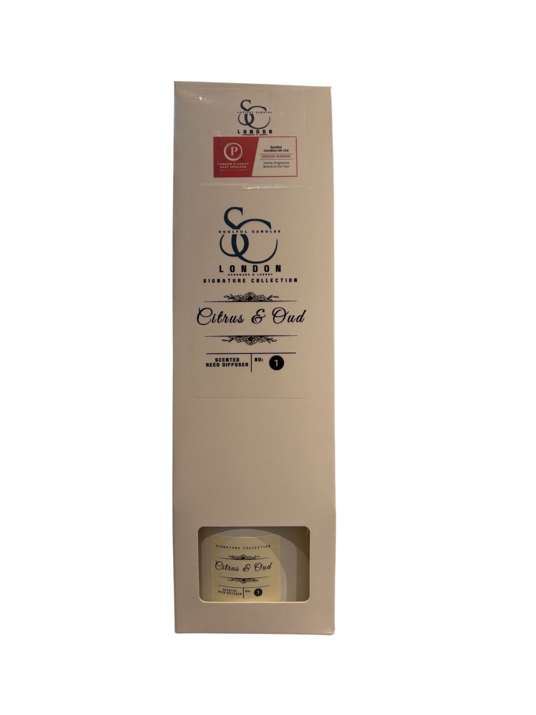 100ml citrus and oud reed diffuser in a white glass bottle packaged in a classic white luxury box with reeds