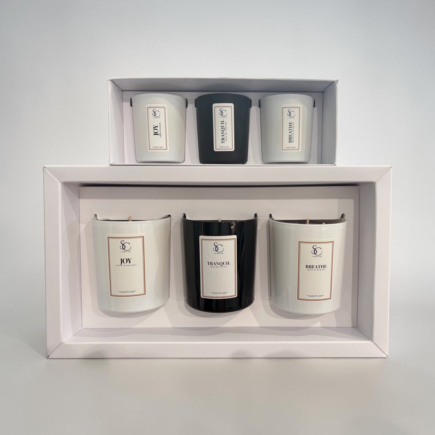 Open Ritual Collection therapy candle gift sets showing 9cl and 30cl candles