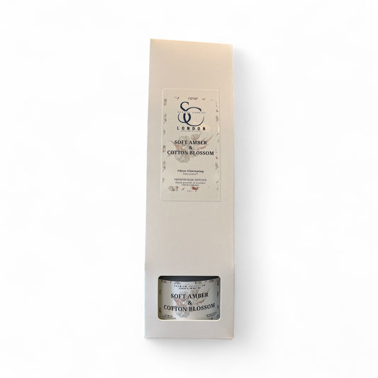  Front of Soft Amber & Cotton Blossom 100ml odour eliminating reed diffuser, white box packaging, handmade in London
