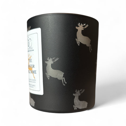 The Winter Welcome Christmas Candle – black jar with engraved reindeer