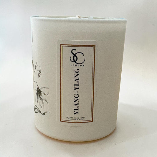 Front view of the Ylang Ylang 9cl Sanctuary soy candle in matt white coated glass