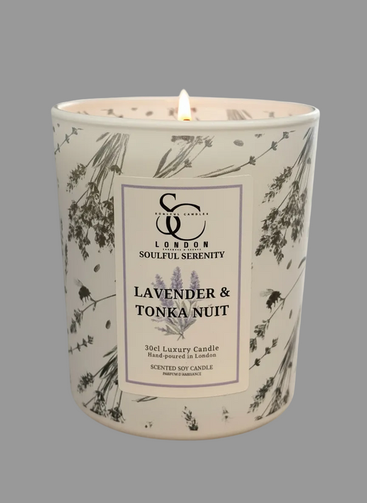 Candle with a decorative label on a white background